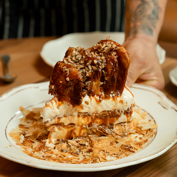 Layered campechana pastry cake served with vanilla ice cream at Cuerno Mexican steakhouse in New York City Layered campechana pastry cake served with vanilla ice cream at Cuerno Mexican steakhouse in New York City