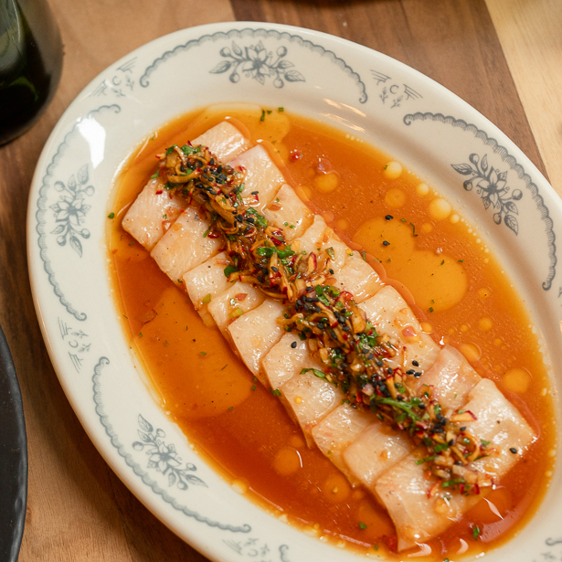 Hamachi sashimi with citrus sauce at Cuerno Mexican steakhouse in New York City Hamachi sashimi with citrus sauce at Cuerno Mexican steakhouse in New York City